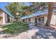 Charming single-story home with well-maintained landscaping and a welcoming walkway at 1550 N Stapley Dr # 21, Mesa, AZ 85203