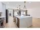 Spacious kitchen with stainless steel appliances, stone countertops and view into other rooms at 1550 N Stapley Dr # 21, Mesa, AZ 85203