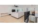 Open-concept living room with large windows and hardwood floors at 1550 N Stapley Dr # 21, Mesa, AZ 85203