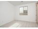 Bright bedroom with neutral carpet and a window overlooking the neighborhood, creating an open space at 1565 E Tiffany Way, Gilbert, AZ 85298