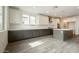 Spacious kitchen featuring gray cabinetry, white countertops, and stainless steel appliances at 1565 E Tiffany Way, Gilbert, AZ 85298