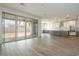 Open concept living space includes a large kitchen, great room, and sliding doors at 1565 E Tiffany Way, Gilbert, AZ 85298