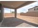 Spacious backyard with a covered patio and block fence, perfect for outdoor entertaining and relaxation at 1571 E Tiffany Way, Gilbert, AZ 85298