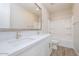 Bright bathroom featuring a double vanity with white countertops and modern fixtures, and a shower-tub combo at 1571 E Tiffany Way, Gilbert, AZ 85298