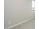 Bedroom with neutral walls, carpeted floor, and a bright window overlooking the neighborhood at 1571 E Tiffany Way, Gilbert, AZ 85298