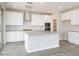 Modern kitchen with white cabinetry, stainless steel appliances, and stylish backsplash at 1571 E Tiffany Way, Gilbert, AZ 85298