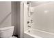 Clean white tiled bathtub and shower combination with chrome shower head at 1644 E Joelle Dr, Casa Grande, AZ 85122