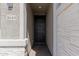 Inviting front door with stone accents and desert landscaping at 1644 E Joelle Dr, Casa Grande, AZ 85122