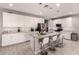 Open kitchen layout highlighting island seating with pendant lighting at 1644 E Joelle Dr, Casa Grande, AZ 85122