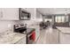 Modern kitchen with granite countertops and stainless appliances at 1644 E Joelle Dr, Casa Grande, AZ 85122