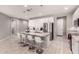 Kitchen featuring a granite island, bar seating, and ample cabinet space at 1644 E Joelle Dr, Casa Grande, AZ 85122