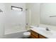 Bathroom featuring a single sink vanity and shower-tub combo at 1650 S Crismon Rd # 6, Mesa, AZ 85209
