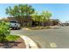 Exterior of the The Golf Club of Estrella clubhouse with a white truck in front at 18368 W Long Lake Rd, Goodyear, AZ 85338