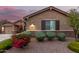 Charming home exterior featuring desert landscaping and an address marker at 18368 W Long Lake Rd, Goodyear, AZ 85338