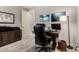 A home office with dual work stations, offering a functional workspace at 18368 W Long Lake Rd, Goodyear, AZ 85338
