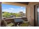 Balcony with table and chairs overlooking neighborhood at 20100 N 78Th Pl # 2203, Scottsdale, AZ 85255