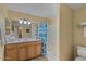 Bathroom features an extended countertop and shower with curtain at 20100 N 78Th Pl # 2203, Scottsdale, AZ 85255
