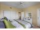 Bright main bedroom includes a closet and dresser at 20100 N 78Th Pl # 2203, Scottsdale, AZ 85255