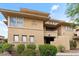 Multi-story condo building with multiple units featuring desert landscaping, stairways and architectural details at 20100 N 78Th Pl # 2203, Scottsdale, AZ 85255