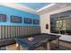 A community game room with a pool table, TVs, and comfortable seating provides entertainment for residents at 20100 N 78Th Pl # 2203, Scottsdale, AZ 85255