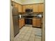 Traditional kitchen featuring stainless steel appliances and light wood cabinetry at 20100 N 78Th Pl # 2203, Scottsdale, AZ 85255