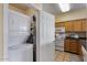 Laundry room is conveniently located near kitchen at 20100 N 78Th Pl # 2203, Scottsdale, AZ 85255