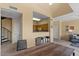 Open floor plan with a dining table, spiral staircase, with views into the kitchen and living room at 20100 N 78Th Pl # 2203, Scottsdale, AZ 85255