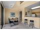 Bright living area with a dining table, breakfast bar, with views of the kitchen at 20100 N 78Th Pl # 2203, Scottsdale, AZ 85255