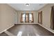 Neutral bedroom with ample natural light and a walk-in closet at 21525 E Camacho Rd, Queen Creek, AZ 85142
