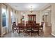 Elegant dining room featuring a chandelier and large window at 21525 E Camacho Rd, Queen Creek, AZ 85142