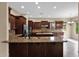 Beautiful kitchen featuring granite counters, stainless appliances, and ample cabinet space at 21525 E Camacho Rd, Queen Creek, AZ 85142