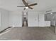 Spacious bedroom with neutral carpet and an open doorway offering a peek into the hallway at 217 E Gwen St, Phoenix, AZ 85042