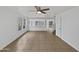 Open-concept living room featuring tile flooring, neutral walls, and natural light at 217 E Gwen St, Phoenix, AZ 85042