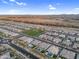 Scenic aerial view of homes in a planned community featuring desert landscaping and green spaces at 22884 E Via De Olivos --, Queen Creek, AZ 85142
