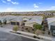 Aerial view of the home with well-maintained landscaping and desert surroundings at 22884 E Via De Olivos --, Queen Creek, AZ 85142
