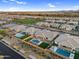 Attractive neighborhood featuring private pools, grassy lawns, and modern homes with desert landscaping at 22884 E Via De Olivos --, Queen Creek, AZ 85142