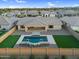 Private backyard featuring a sparkling pool, manicured lawn, and a covered patio, ideal for relaxing and entertaining at 22884 E Via De Olivos --, Queen Creek, AZ 85142