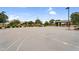 Community basketball court with hoops, shelter, and seating on a clear day at 22884 E Via De Olivos --, Queen Creek, AZ 85142