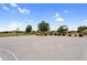 Community basketball court featuring multiple hoops and manicured landscaping at 22884 E Via De Olivos --, Queen Creek, AZ 85142