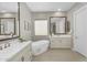 Bathroom featuring dual sink vanities, a freestanding tub and warm, neutral tones at 22884 E Via De Olivos --, Queen Creek, AZ 85142