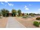Charming community garden featuring raised beds, pergola, and a shaded area for gatherings at 22884 E Via De Olivos --, Queen Creek, AZ 85142