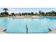 Spacious community pool with clear blue water, providing the ultimate in aquatic enjoyment at 22884 E Via De Olivos --, Queen Creek, AZ 85142