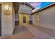 Welcoming entryway showcasing a brick walkway, stucco walls, and decorative stone accents at 22884 E Via De Olivos --, Queen Creek, AZ 85142