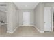 An inviting entryway featuring neutral walls, tile flooring, and a well-lit atmosphere at 22884 E Via De Olivos --, Queen Creek, AZ 85142