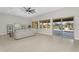 Open living space with seamless transition to the outdoor pool area, blending indoor and outdoor living at 22884 E Via De Olivos --, Queen Creek, AZ 85142