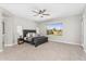 Spacious bedroom suite with ceiling fan, carpeted floor, and natural light at 22884 E Via De Olivos --, Queen Creek, AZ 85142