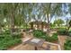 Community park showcasing tables, checkerboard, greenery and walking path for outdoor recreation at 22884 E Via De Olivos --, Queen Creek, AZ 85142
