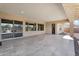 Covered patio featuring tile flooring, windows, and access to the backyard at 22884 E Via De Olivos --, Queen Creek, AZ 85142