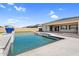 Stunning pool and outdoor area with luxurious tiling and lush turf, perfect for relaxation and entertaining in style at 22884 E Via De Olivos --, Queen Creek, AZ 85142
