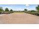 Outdoor volleyball court featuring manicured landscaping, a net, and a sand surface at 22884 E Via De Olivos --, Queen Creek, AZ 85142